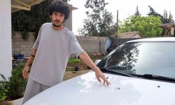 Sesle panik ve korku yaşayan vatandaşın aracına yorgun mermi isabet etti