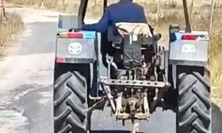 Köpeği traktöre bağlayarak sürükledi