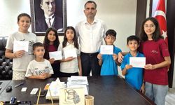 Kozan'da miniklerden afetzedelere 15 bin liralık destek