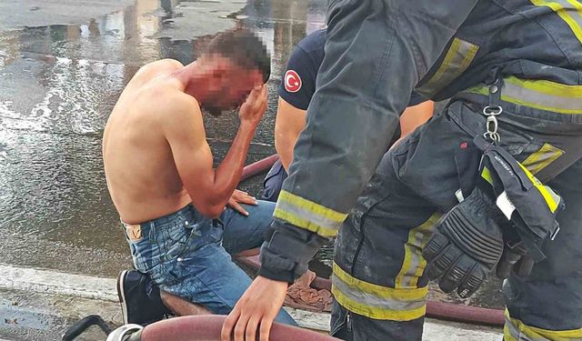 Üzerine döktüğü benzin gözlerinden ediyordu