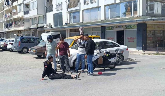 Bisikletli çocuğa çarpmamak için motosikletini devirip yaralandı