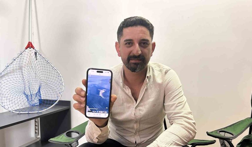 Oltaya köpek balığı takılınca korktular, ardından kurtarmak için çabaladılar