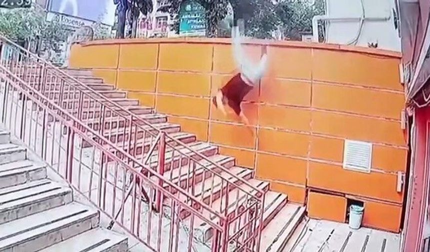 Beton blokta uzandı, dengesini kaybedip merdivenlere düştü